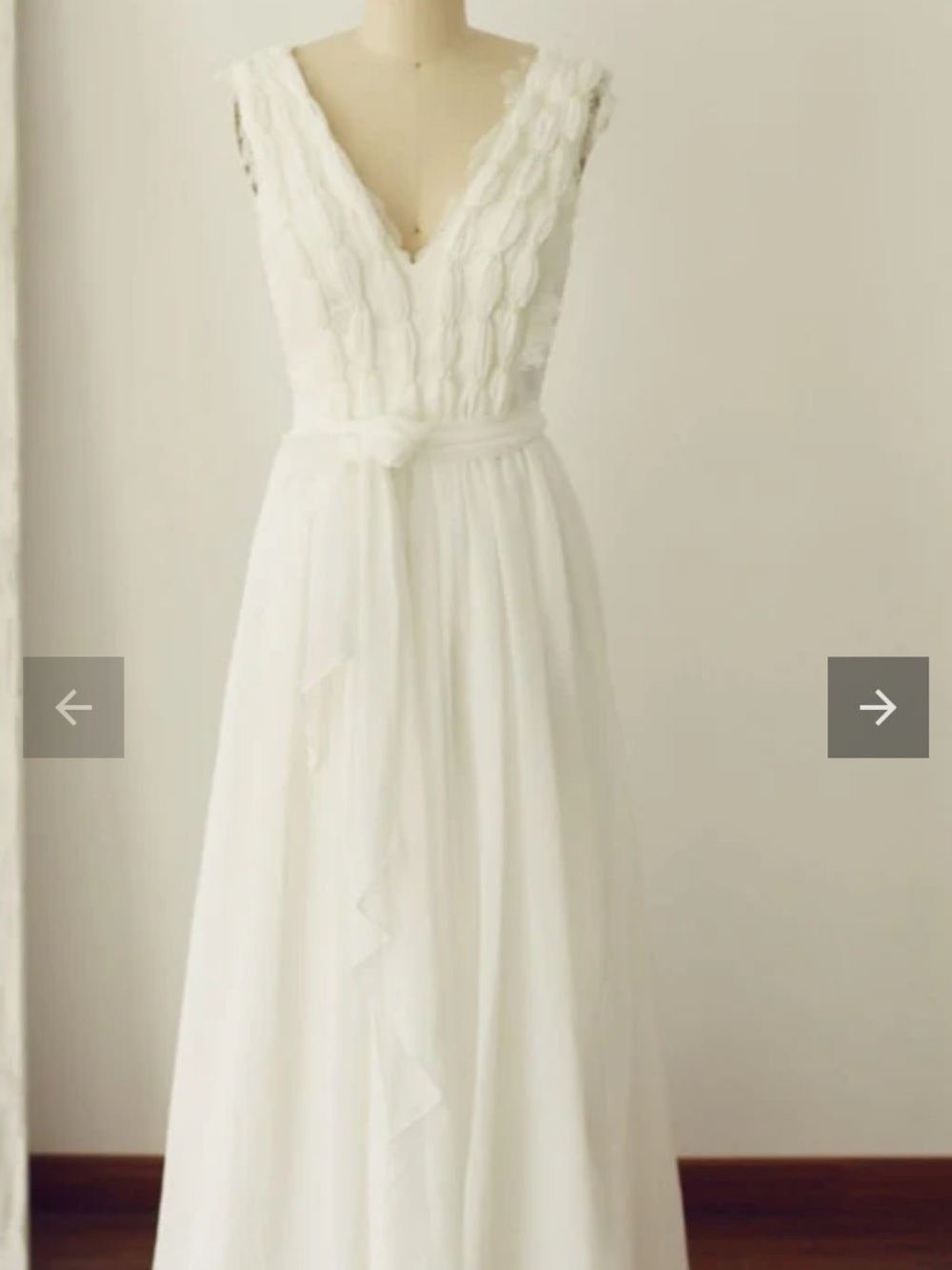 Elegant V-Neck White Bridal Gown with Textured Bodice and Sash